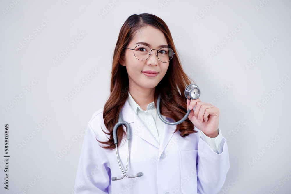 Asian female doctor standing smiling on white background medical concept. Asian female doctor standing smiling on white background medical concept.