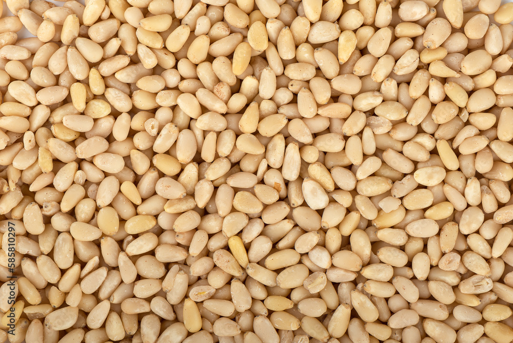 Full frame of shelled pine nuts as background. Full frame of shelled pine nuts as background.