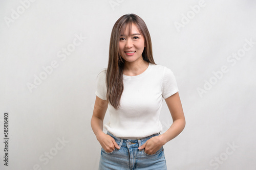 Portrait of young beautiful woman smiling over white background studio.