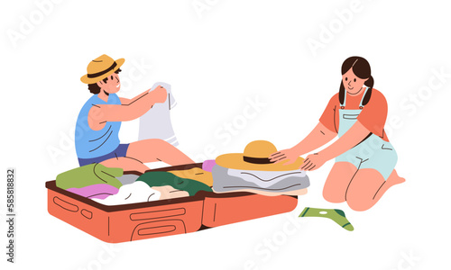 Cute happy children packing luggage suitcase folding clothes and belongings for summer vacation