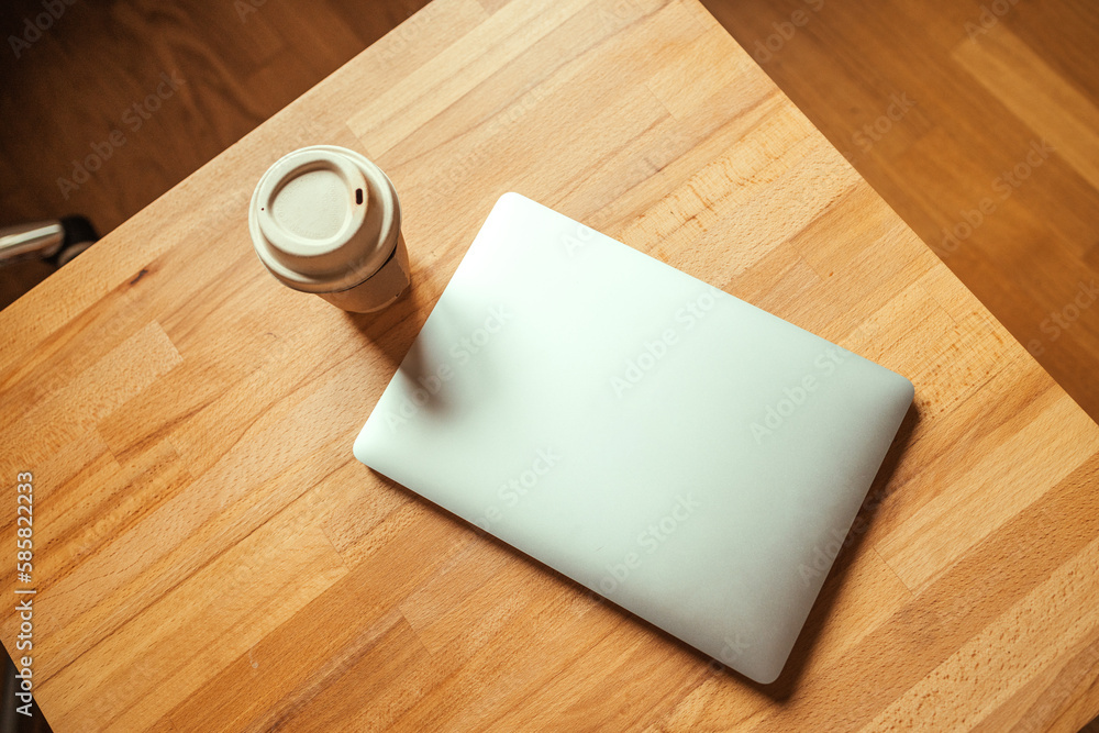 Office stuff with laptop and coffee cup mouse notepad top view shot. High quality photo Office stuff with laptop and coffee cup mouse notepad top view shot. High quality photo