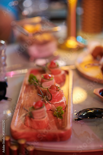 Delicious appetizers on table in restaurant or bar