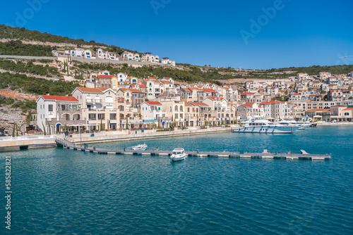 Lustica bay in Montenegro on the Adriatic coast, view of the city and the marina with yachts. Popular summer holiday destinations in Europe
