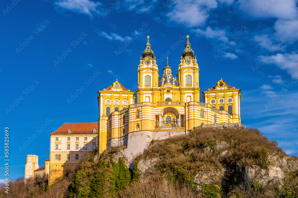 Scenic view of Melk Abbey in Austria against dramatic winter sky