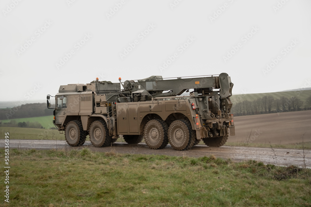 British army MAN SVR (Support Vehicle Recovery) 8x8 in motion on a dirt track British army MAN SVR (Support Vehicle Recovery) 8x8 in motion on a dirt track