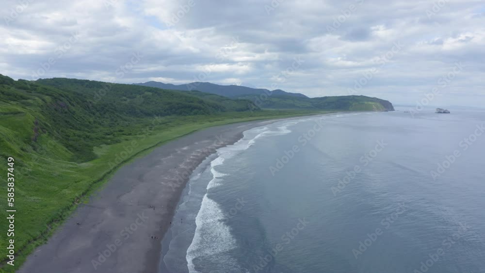 Khalaktyrsky beach with black sand on Kamchatka peninsula, Russia, Pacific ocean Khalaktyrsky beach with black sand on Kamchatka peninsula, Russia, Pacific ocean