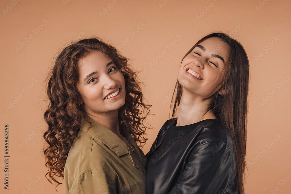 Portrait of two young happy girls, studio shoot, Portrait of two young happy girls, studio shoot,