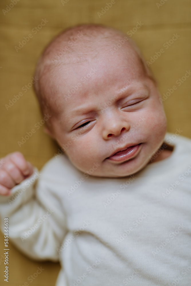 High angle view of little baby in little bed. High angle view of little baby in little bed.