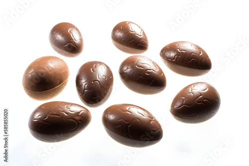 a group of chocolate eggs on a white background