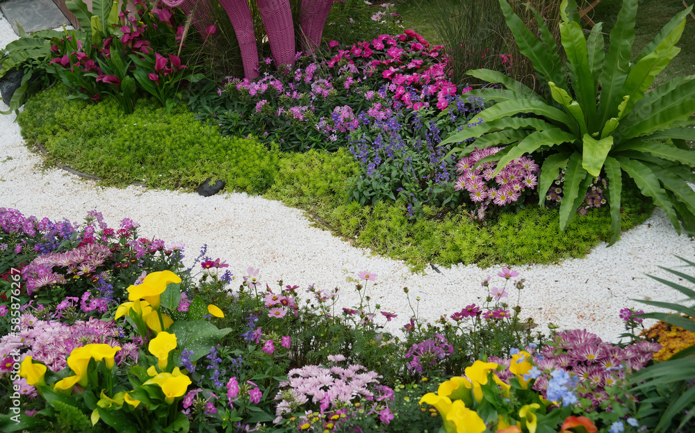 flower path leading through a garden flower path leading through a garden