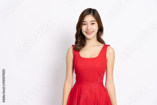 Portrait of Asian woman in red dress isolated on white background