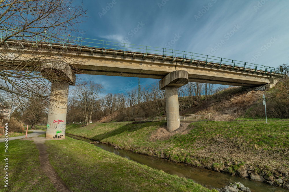 Railway bridge near Rakovnik station in spring color morning Railway bridge near Rakovnik station in spring color morning