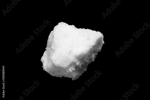 White snow isolated on black background close up