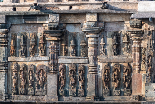 Beautiful carvings on the wall of the ancient Chennakeshava temple in the town of Belur in Karnataka. photo