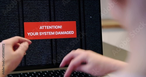 Woman having problems with laptop while using online email app, app crash warning, broken computer crash, operation error, screen focus, back view closeup