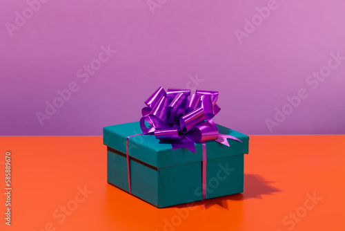 Bright gift box with bow and ribbons