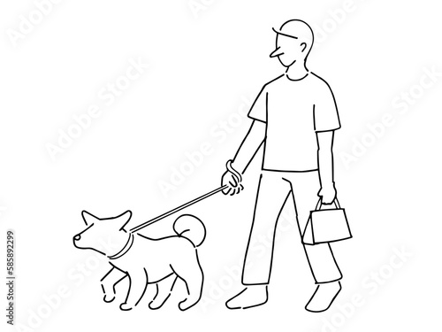 犬の散歩をする人