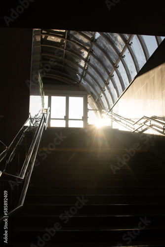 Sunlight on a dark staircase close up