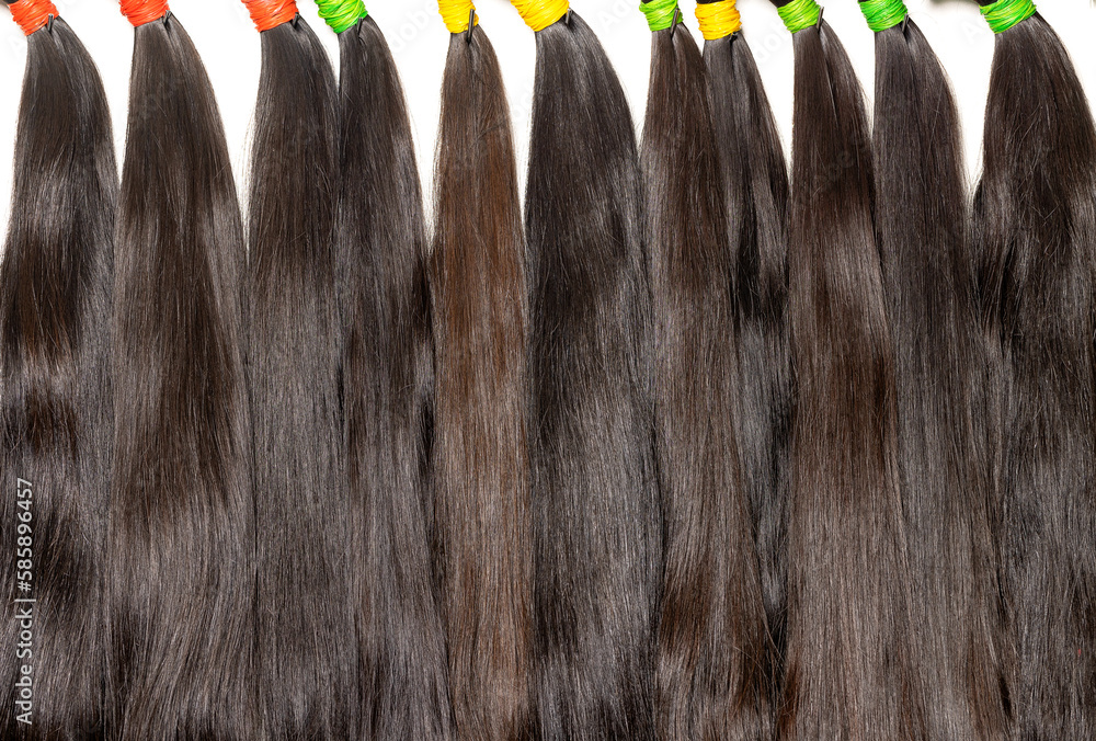 Healthy chocolate colored human hair bundles for extensions and hairstyles.