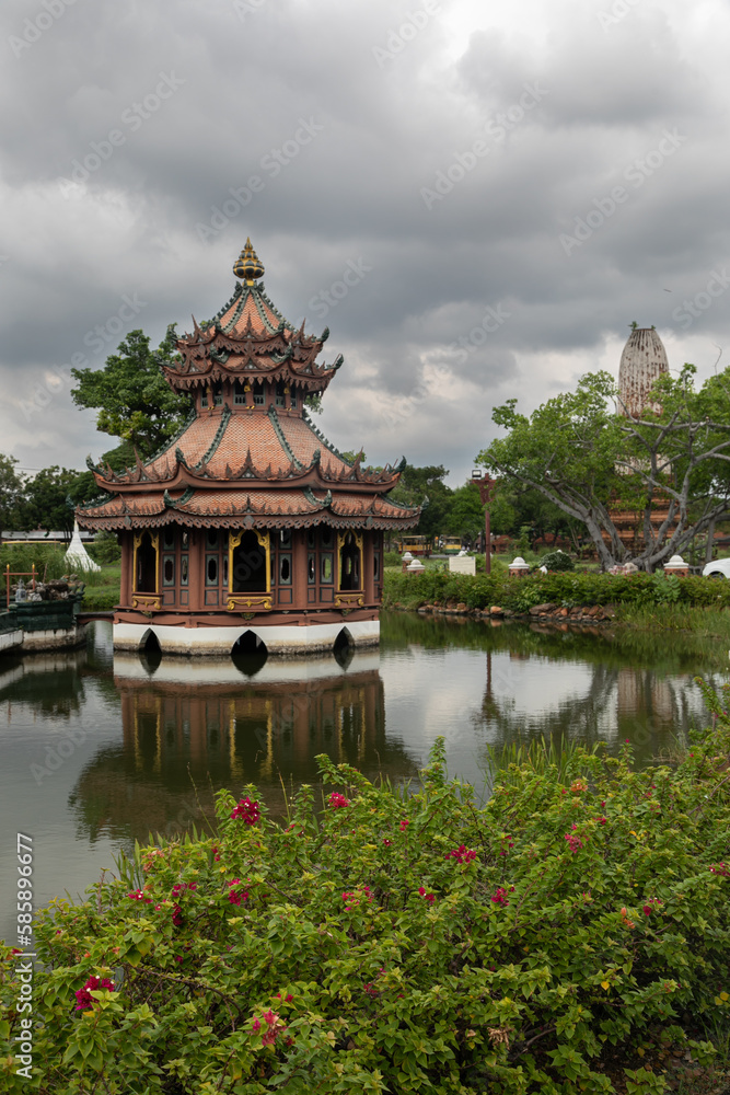 Architectural park of Oriental culture. Religious buildings of Thai history: palace and temple complexes. The exhibits are surrounded by ponds, tropical greenery and flowers Architectural park of Oriental culture. Religious buildings of Thai history: palace and temple complexes. The exhibits are surrounded by ponds, tropical greenery and flowers
