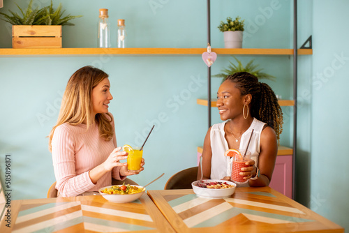 Young black and caucasian w...