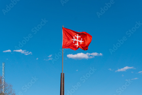 Bandiera di Pisa, in Italia. Croce pisana, simbolo storico della città photo