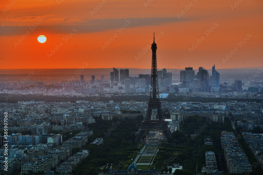 Golden Hour in the City of Light: A stunning panoramic view of Parisian streets and the iconic Eiffel Tower at sunset, capturing the romantic ambiance of the French capital