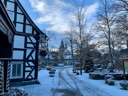 Snow covered town and wood near the german town of Winterberg in province Sauerland, Germany