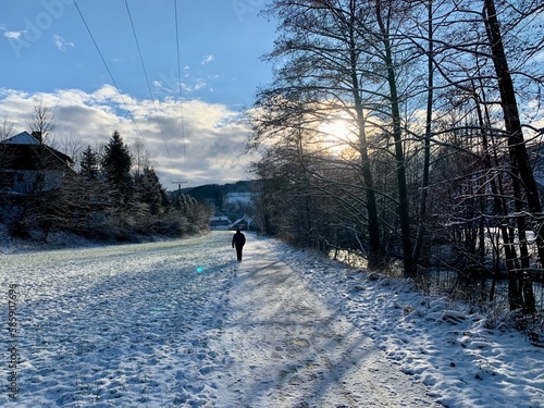 Snow covered town and wood near the german town of Winterberg in province Sauerland, Germany