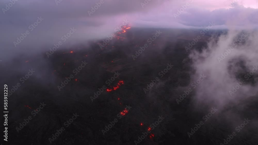 Aerial of untouched wilderness nature above erupting volcano at scenic