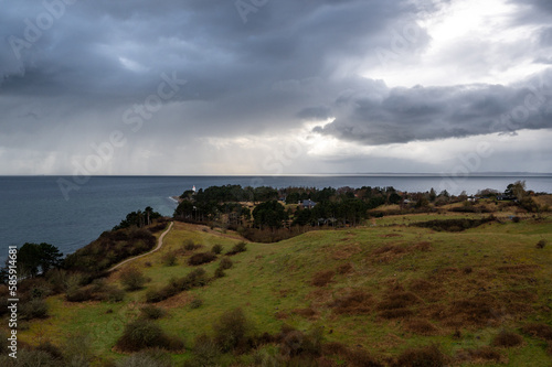 dramatic light and skies over djursland and mols bjerge in denmark