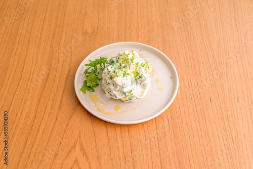 Tzatziki, the Greek version of cacık, is a cucumber and yogurt-based sauce, consumed in many dishes, especially meat