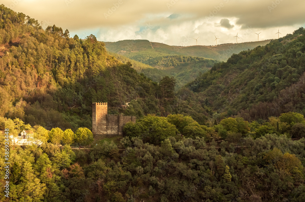 Lousã Castle in Portugal, with the Lousã mountains in the background. Lousã Castle in Portugal, with the Lousã mountains in the background.