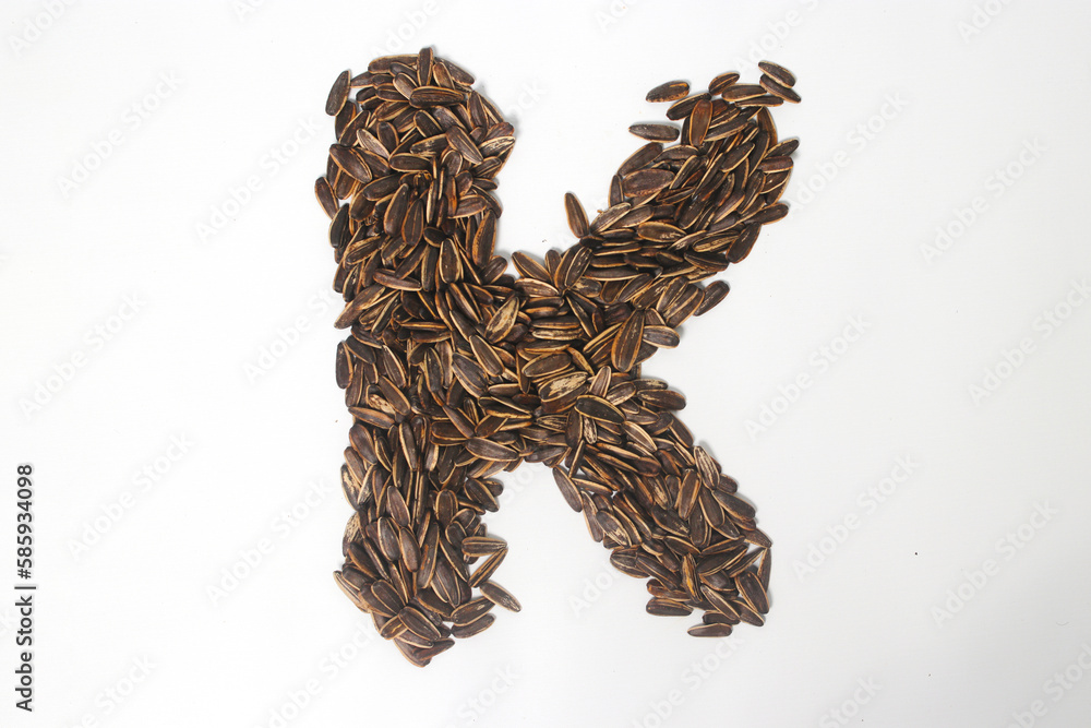 Fototapeta premium Alphabet made from Sunflower Seeds