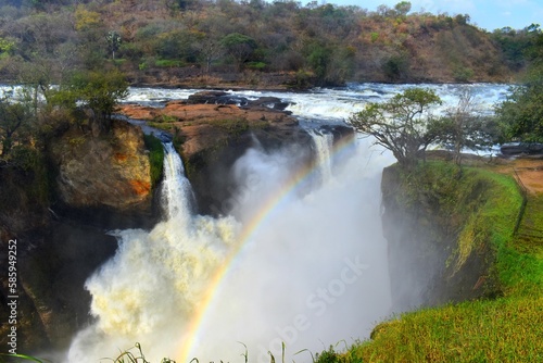 Waterfall with rainbow in Uganda