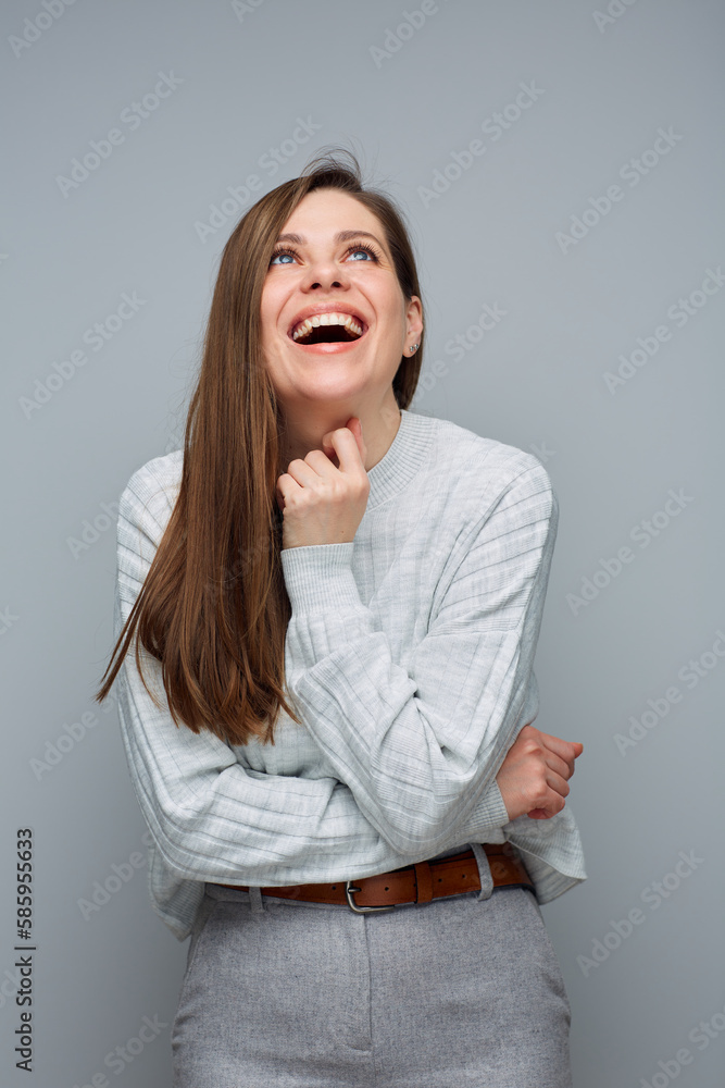 Portrait of happy woman looking up in casual light clothing. Portrait of happy woman looking up in casual light clothing.
