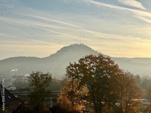 A beautiful autumn sunset in Reutlingen with the Achalm in the background. photo