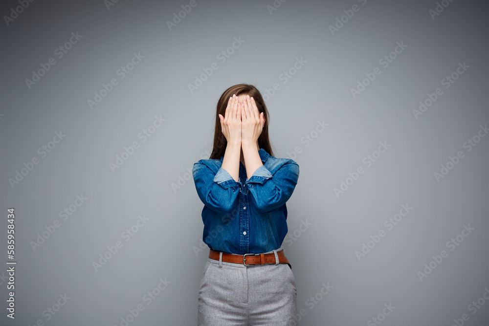 Woman covered her face with hands. Stop violence concept. Woman covered her face with hands. Stop violence concept.