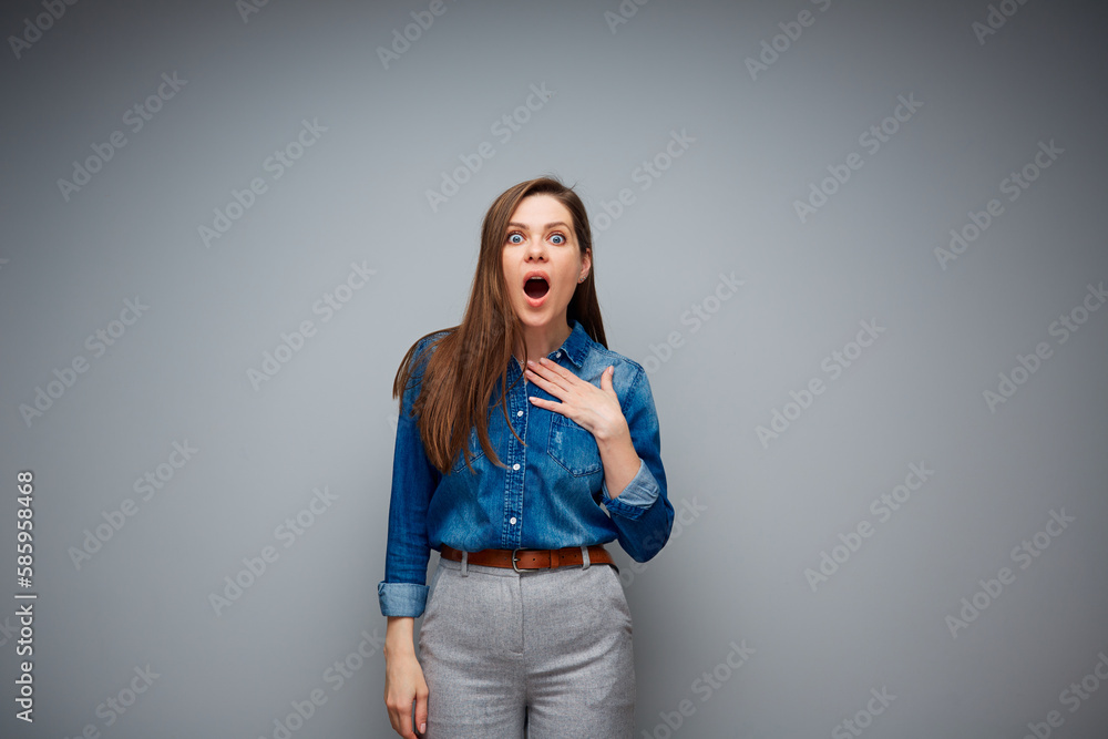Excited woman isolated portrait on gray back. Excited woman isolated portrait on gray back.