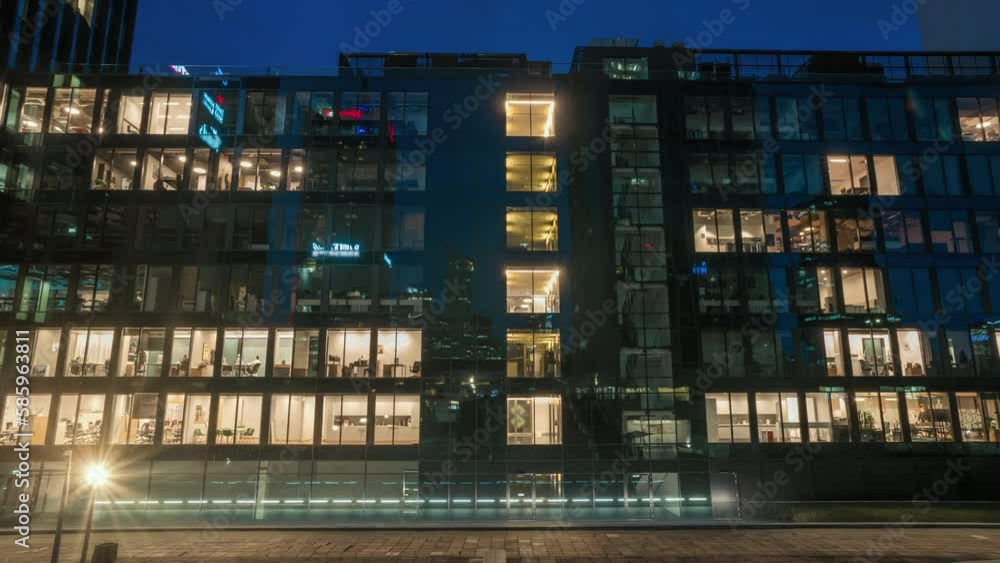 Lapse Window Day to night transition blinking office window lights time-lapse ...