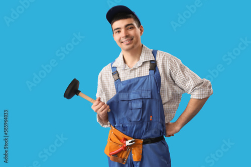 Young male plumber with plu...