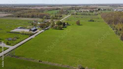 Flying over rural fields on a sunny day in Port Colborne. photo