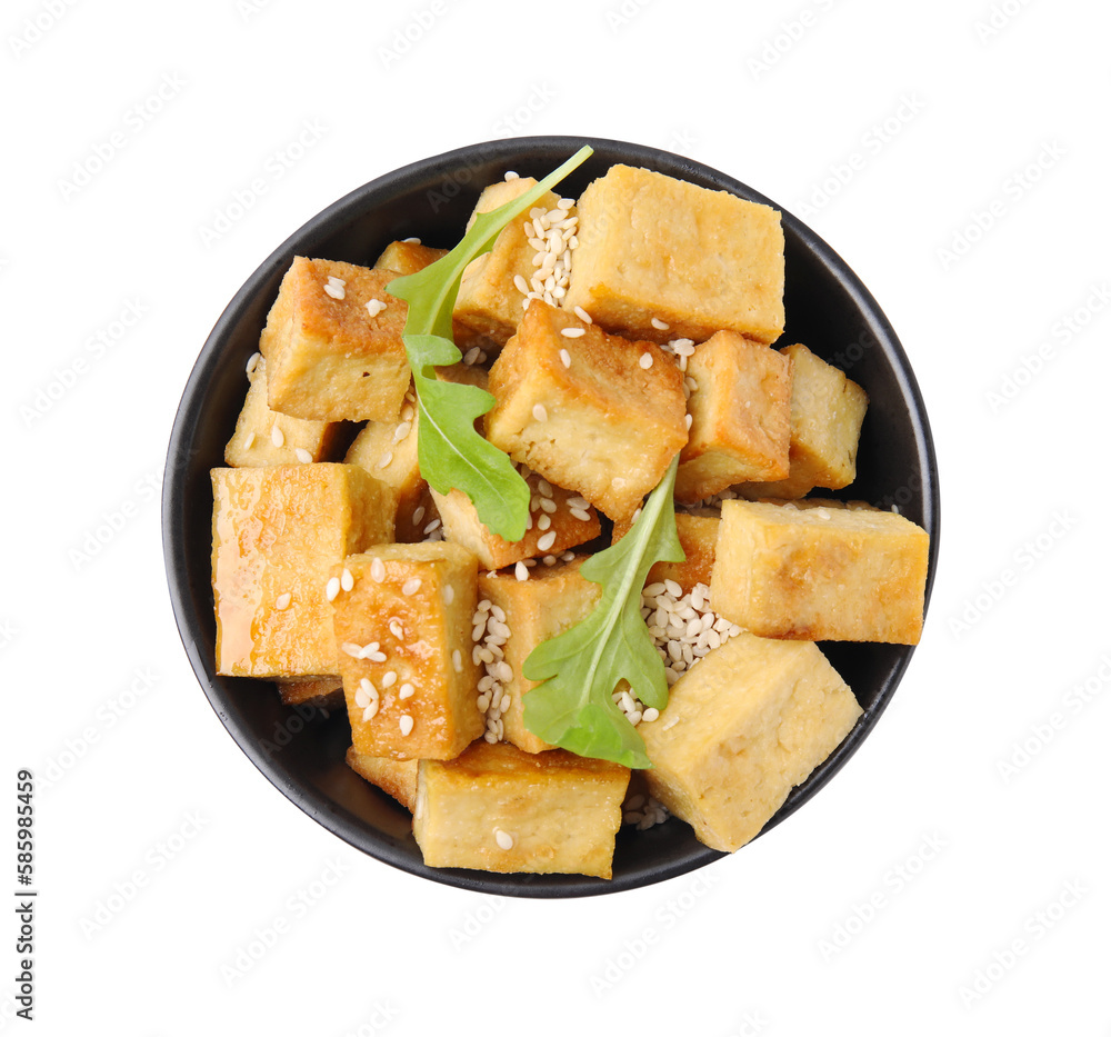 Delicious fried tofu, basil and sesame seeds in bowl isolated on white, top view Delicious fried tofu, basil and sesame seeds in bowl isolated on white, top view