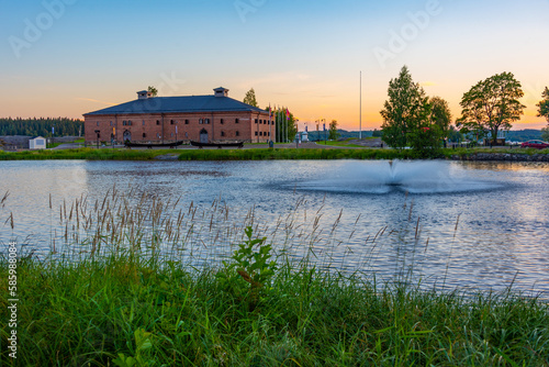 Sunset view of Savonlinna Riihisaari Museum in Finland photo