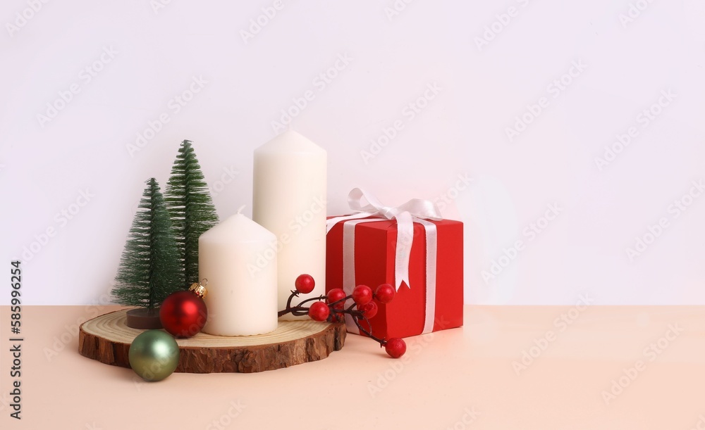 Background design with Christmas decorations and candles Background design with Christmas decorations and candles
