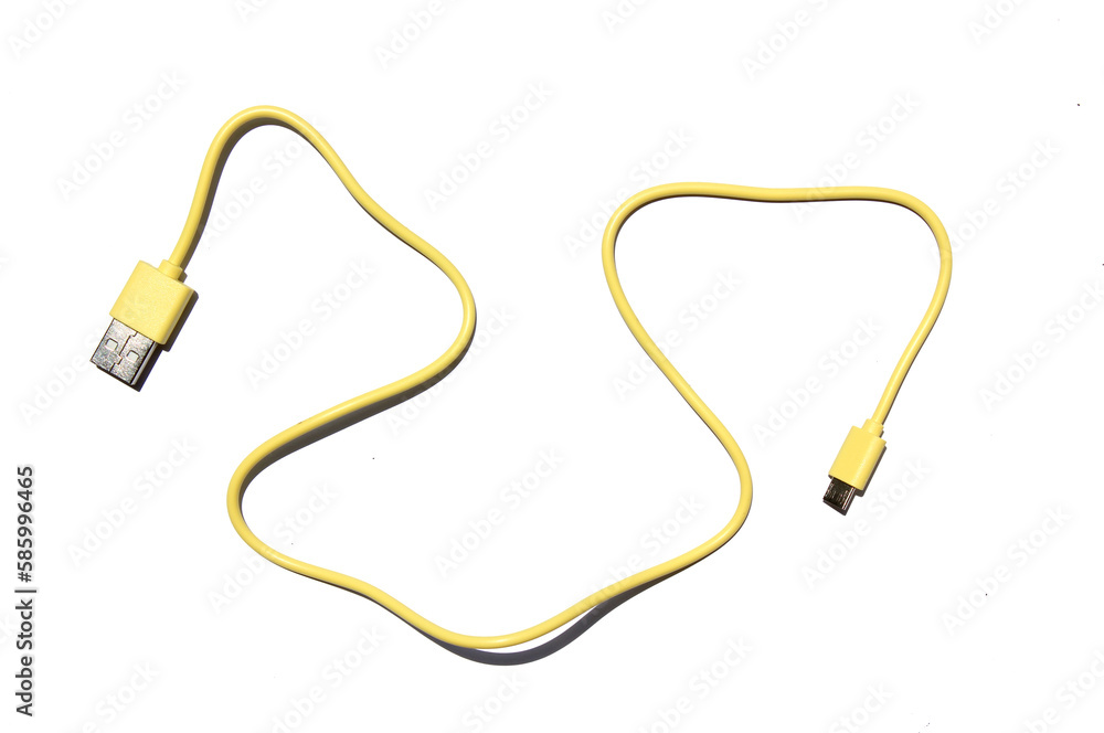 Obraz premium yellow USB cable on white background. USB and USB-mini cable connectors close-up. A patch cable or patch cord or patch lead.