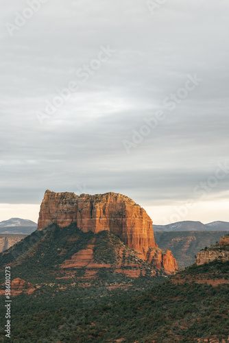 Capital Butte Rock lit up at sunset as seen from Cathedral Rock in Sedona.