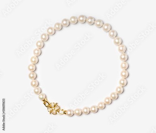 Freshwater pearl bracelet with gold hook and diamonds on white background. Collection of luxury jewelry accessories. Studio shot