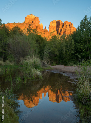 Cathedral Rock reflected in water at sunset, view from Crescent Moon Ranch picnic site - Sedona, USA