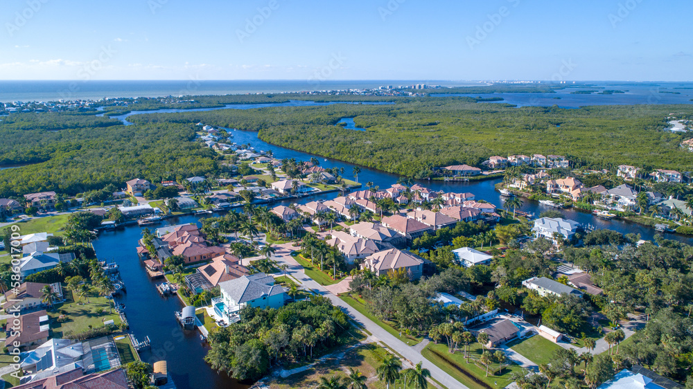 Aerial Drone View of Water Passages and Mangroves in Cape Coral, Florida with Waterfront Real Estate in the Foreground